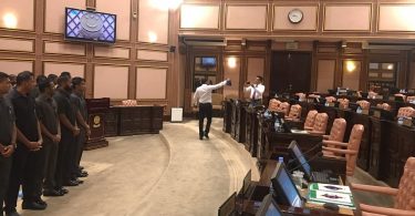 Security officers surround Speaker Maseeh inside the parliament chambers, seen on the left. PHOTO: AHMED NIHAN