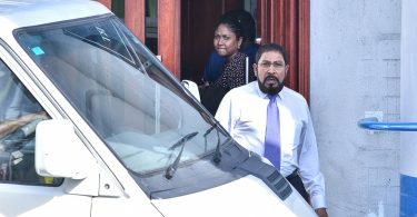 JP leader Qasim Ibrahim exits the Criminal Court after a hearing. PHOTO: HUSSAIN WAHEED/MIHAARU