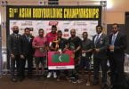Shaaheen Ibrahim Didi (C) pictured with the trophy after he won the gold medal at the 51st Asian Bodybuilding and Physique Sports Championships 2017.