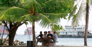 Bangladeshi workers relaxing