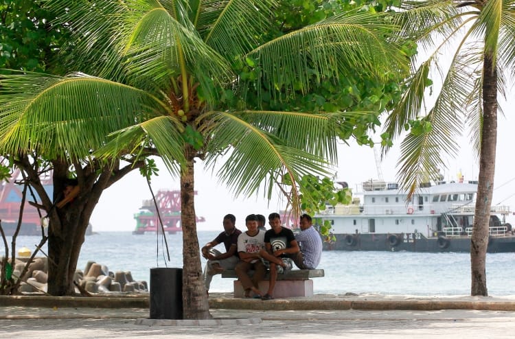 Bangladeshi workers relaxing