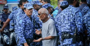 Police and protester