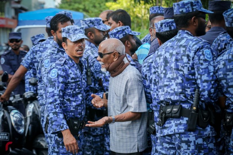 Police and protester
