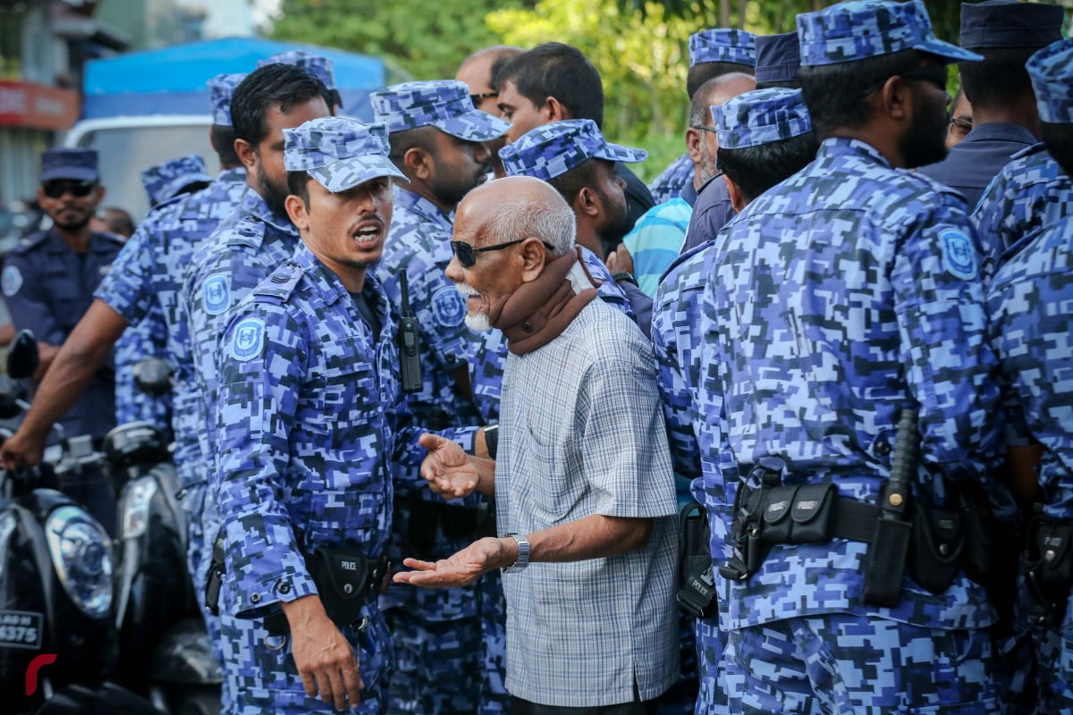 Police and protester