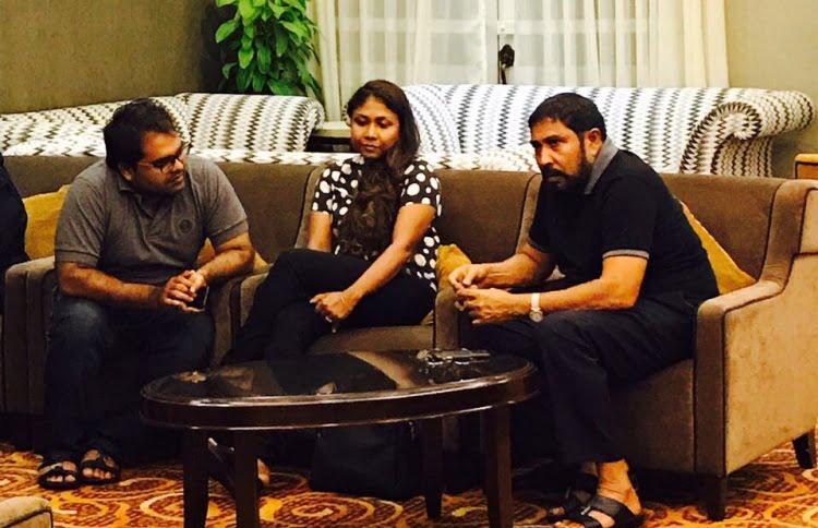 Qasim Ibrahim (R) with his lawyers at the VIP lounge in Velana International Airport (VIA) before departing to Singapore.