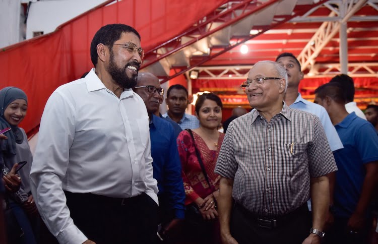 Former president Maumoon Abdul Gayoom (R) with Jumhoory Party's (JP)leader Qasim Ibrahim (L) at a gathering held in JP's official party camp Kunooz. PHOTO / MIHAARU