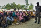 Rohingya Muslims from Myanmar, who tried to cross the Naf river into Bangladesh to escape sectarian violence, are kept under watch by Bangladeshi security officials in Teknaf on December 25, 2016. Border Guard Bangladesh (BGB) personnel have intercepted 34 boats carrying some 340 Rohingyas at border points near Cox's Bazar. / AFP PHOTO / STR