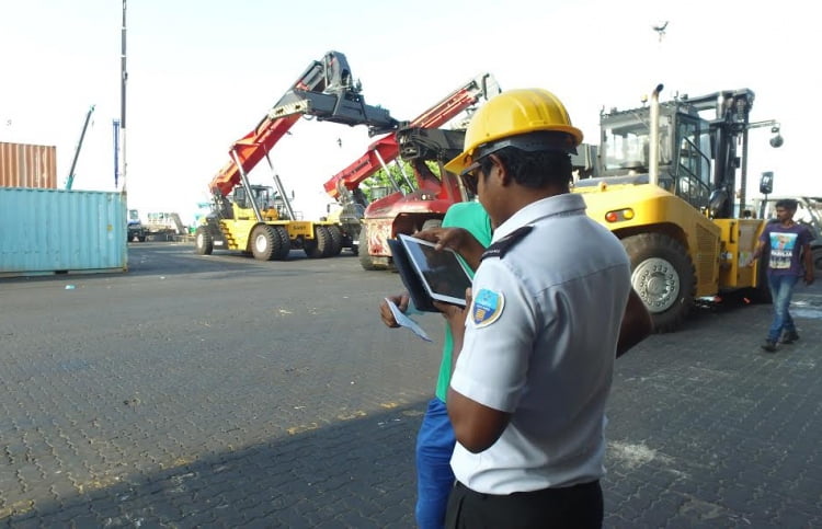 A Customs officer checks a cargo of imported goods. PHOTO/CUSTOMS