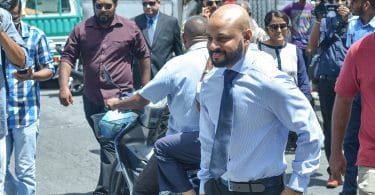 Dhiggaru MP Faris Maumoon arrives at the Criminal Court for his preliminary hearing. PHOTO: HUSSAIN WAHEED/MIHAARU
