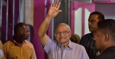 Former president and PPM leader Maumoon Abdul Gayoom waves to his supporters outside the PPM Office. PHOTO/MIHAARU