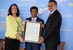 Health Minister Abdulla Nazim Ibrahim (C) receives WHO's award to the Maldives for the successful eradication of measles from the country. PHOTO/HEALTH MINISTRY