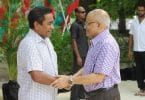 Former president Gayoom (R) shakes the hand of his half brother and incumbent president Yameen at a ceremony. FILE PHOTO/PRESIDENT'S OFFICE