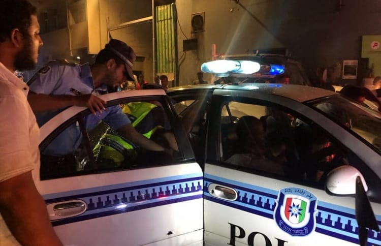 Police escorting expat