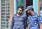 Police arrest Afrah Abdul Razzaq, 21, a suspect wanted in connection to the murder of Mohamed Anas. PHOTO: HUSSAIN WAHEED/MIHAARU