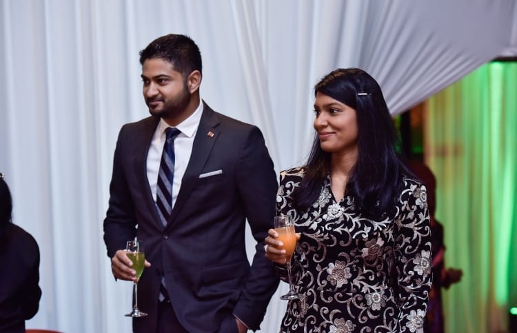 Amin Javed Faizal (L) with his wife, gender minister Zeneesha Zaki, pictured at the official Independence Day ceremony in July 2017. PHOTO: HUSSAIN WAHEED/MIHAARU