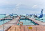 Seaplanes of Maldivian docked at Velana International Airport.