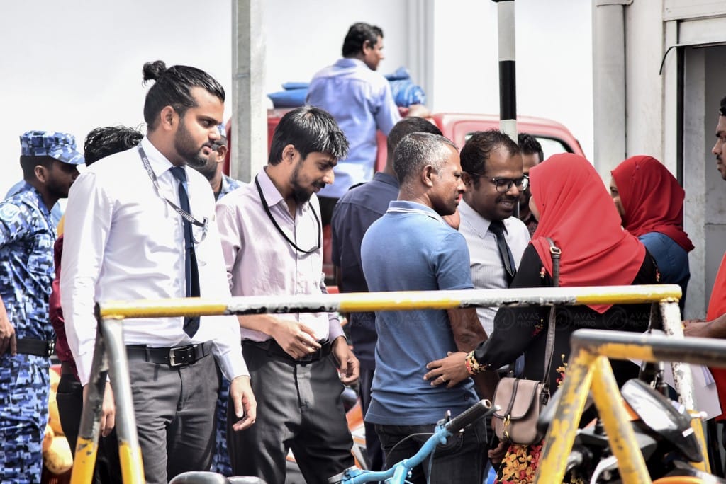 Sun Media's Hussain with other journalists