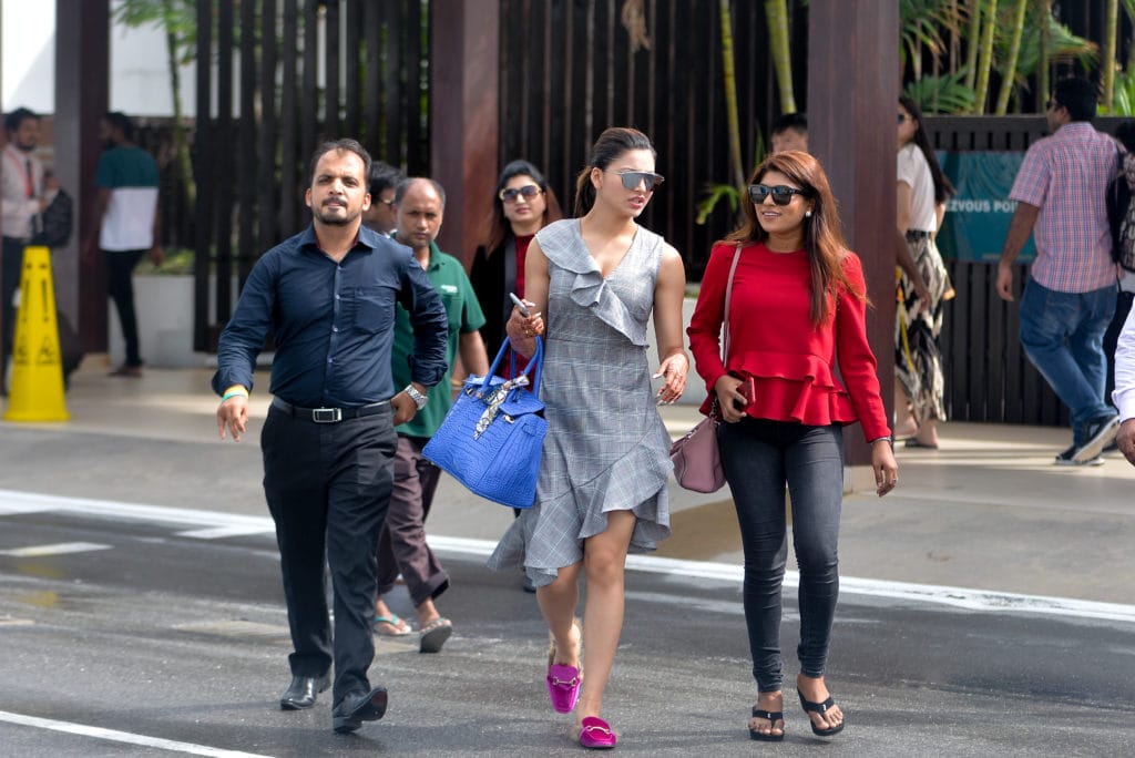 Urvashi Rautela walks out of the terminal at Velana International Airport with MATATO and Adaaran officials