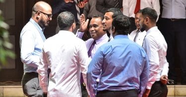 Lawmakers pictured outside the parliament house. PHOTO: HUSSAIN WAHEED/MIHAARU