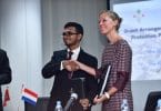 Finance minister Ahmed Munawar (L) and Embassy of Netherlands's deputy head of mission Eva Woersem sign and exchange agreement for RVO to grant USD 10.7 million for the Fuvahmulah coastal protection project.