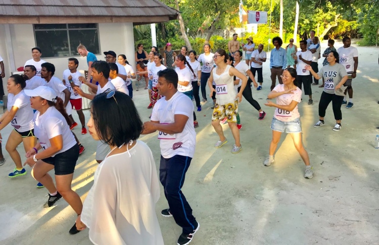 Staff and guests and Bandos Island Resort during the marathon held on December 10, 2017 at the island to mark its anniversary.