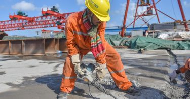 CCCC employee pictured at work on the China-Maldives Friendship Bridge.