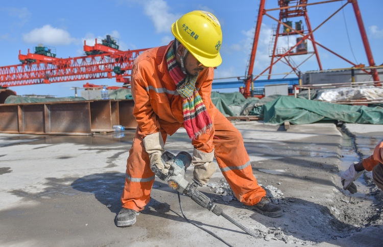 CCCC employee pictured at work on the China-Maldives Friendship Bridge.