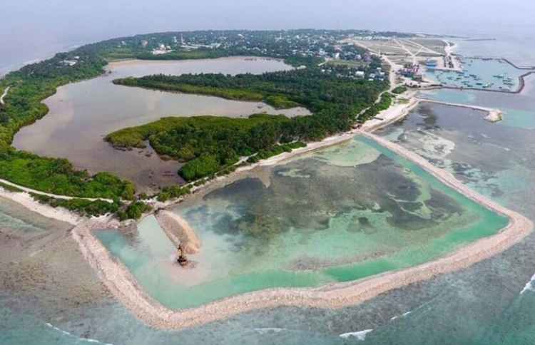 Aerial view of HDh Kulhudhuffushi shows ongoing land reclamation.