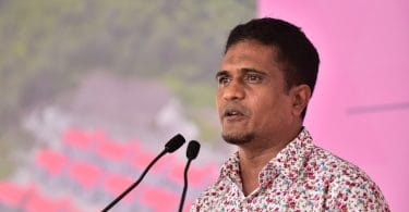 PPM's PG leader Ahmed Nihan speaks at the ceremony in which CMEC handed over 1,500 flats to the Maldivian government. PHOTO: HUSSAIN WAHEED/MIHAARU