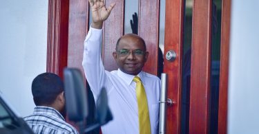 Henveiru North MP Abdulla Shahid waves before his hearing at the Criminal Court. PHOTO: NISHAN ALI/MIHAARU