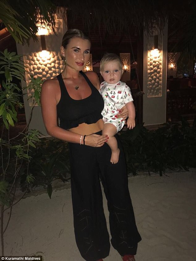 Baby love: The 27-year-old former TOWIE star looked sensational as she posed up a storm at luxury Maldivian resort, Kuramathi, with her son Arthur, 10 months