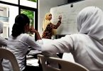 A teacher in class