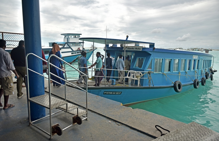 Commuters boarding a ferry