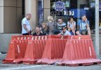 tourists at a police blockade