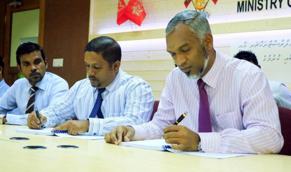 Housing Minister with the former heads of MRDC