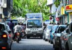 Police vehicle with riot police