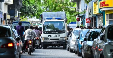 Police vehicle with riot police